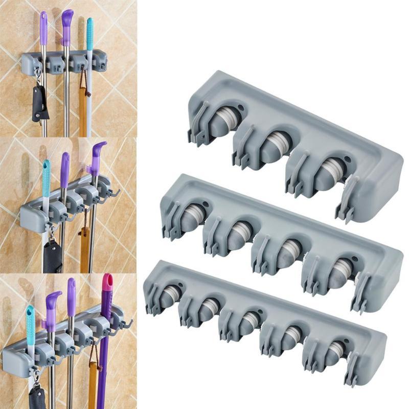 Heavy Duty  Wall Mounted  Broom & Mop Holder for  Garage, Kitchen & Utility Room Organization .